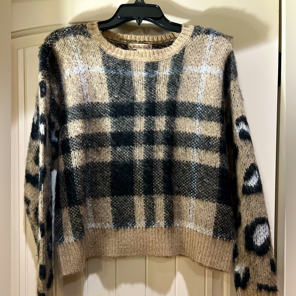Tan and black sweater, size medium.